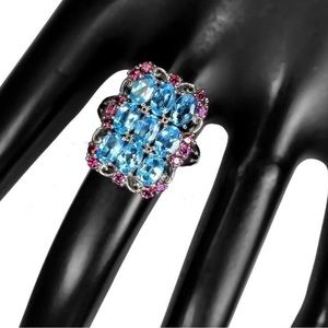 Sky Blue Topaz and Garnet Ring